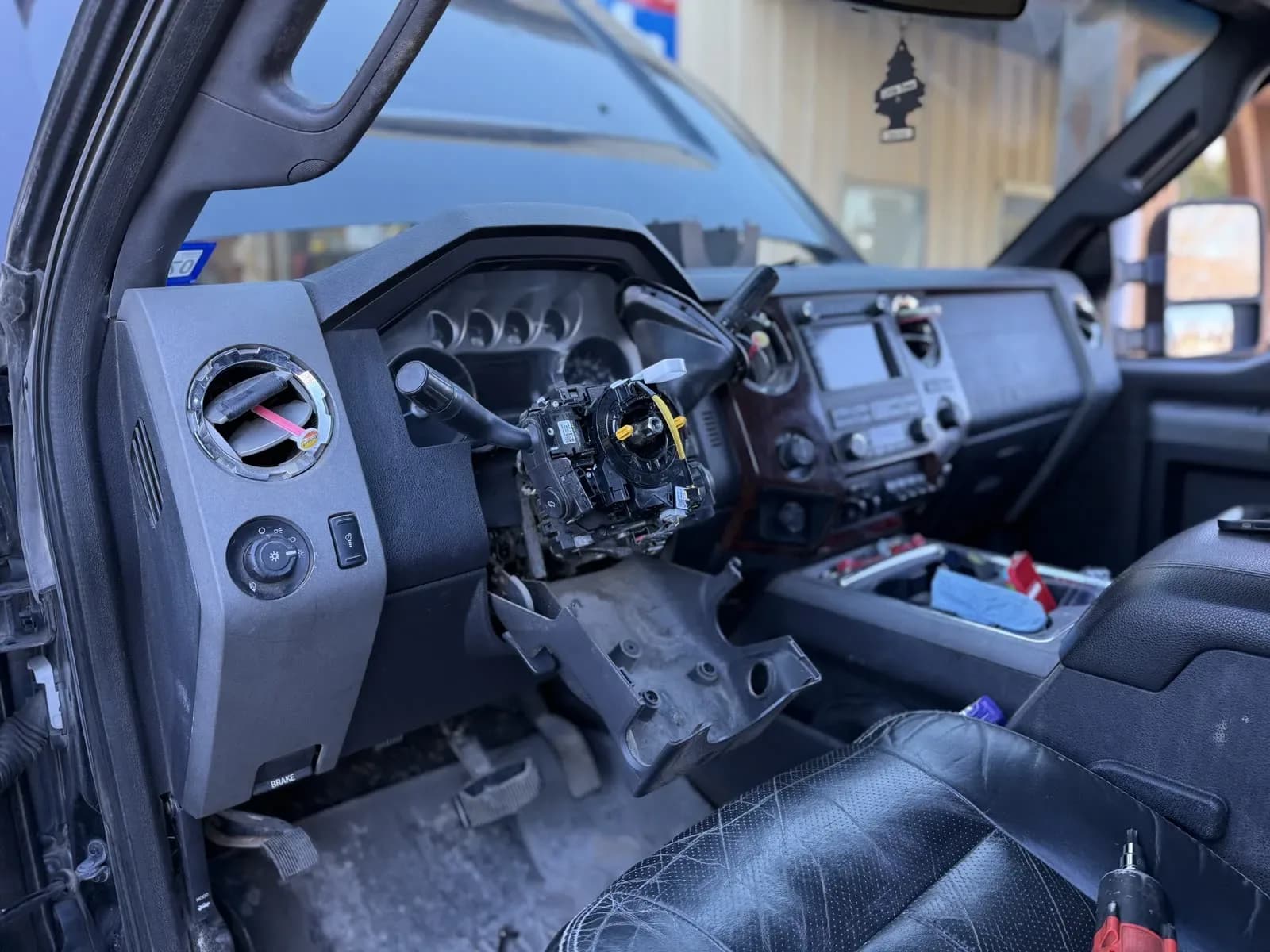 Truck dashboard disassembled for electrical diagnosis and repair