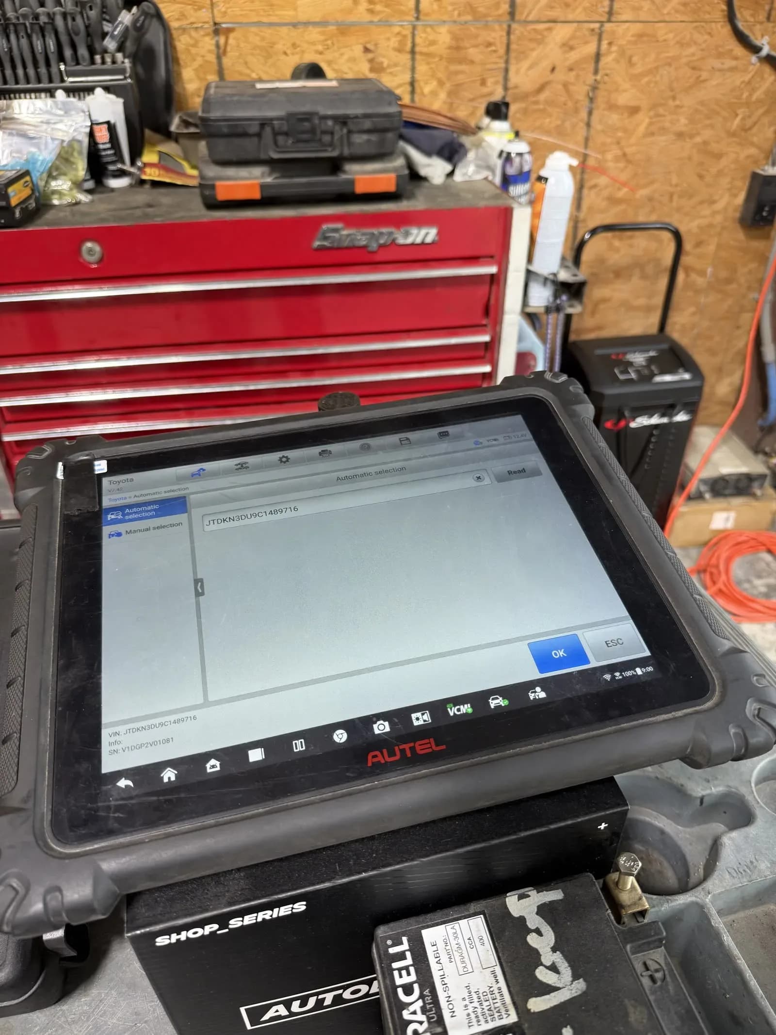 Diagnostic scan tablet in use at Quality Mechanics