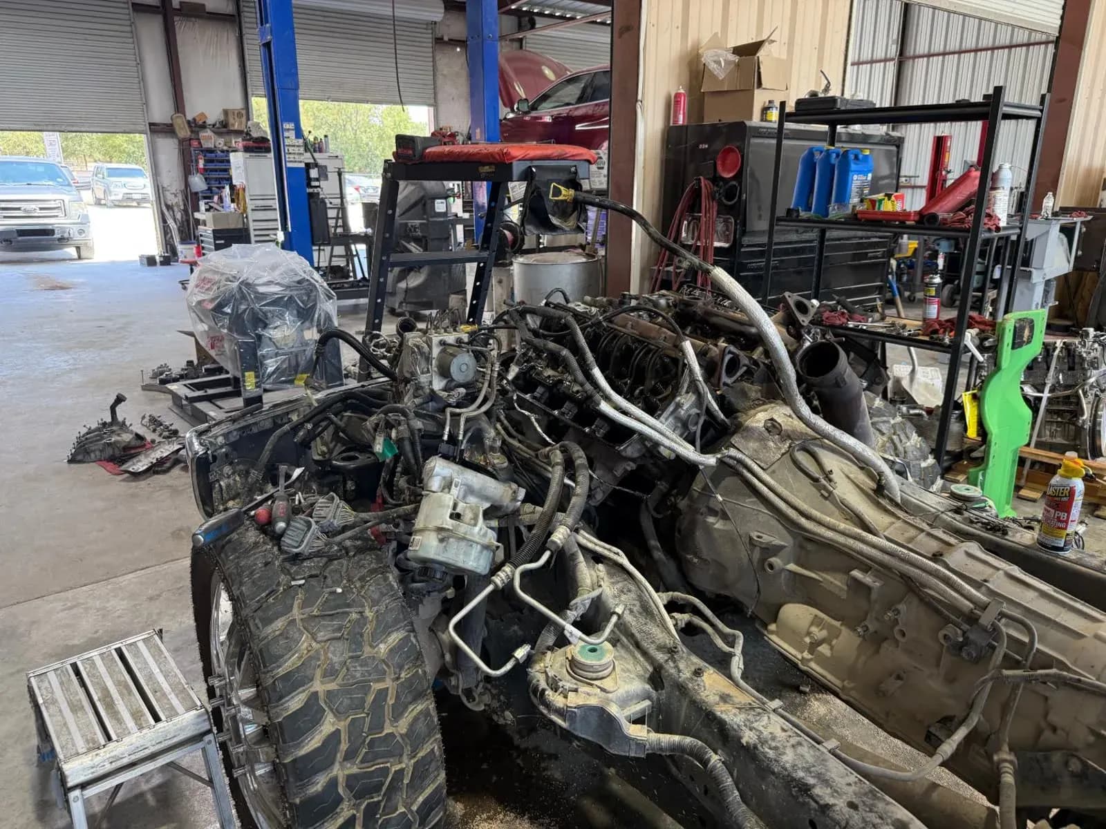 Diesel truck torn down for engine repair in the Quality Mechanics shop