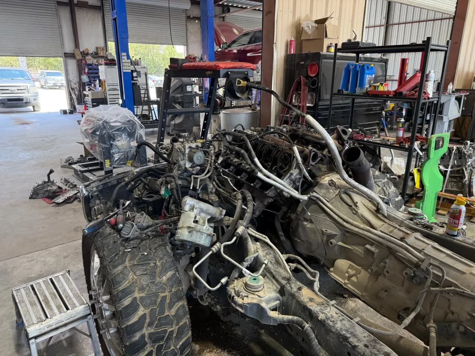 Diesel truck torn down for engine repair in the Quality Mechanics shop