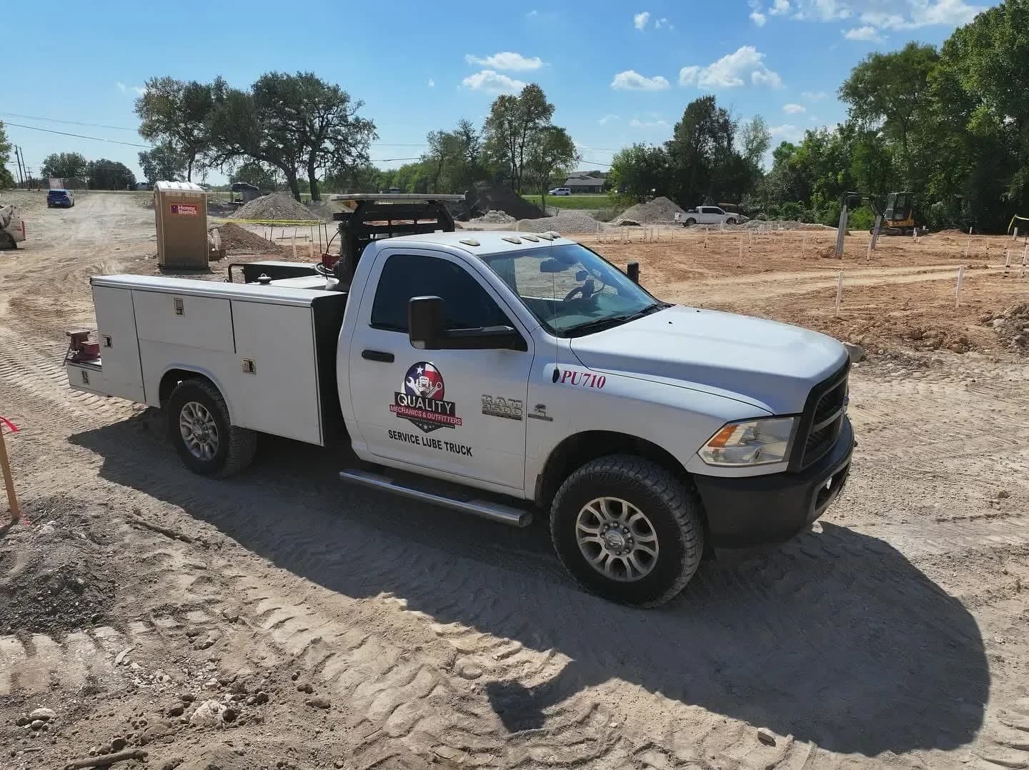 Quality Mechanics mobile service truck at a Central Texas jobsite